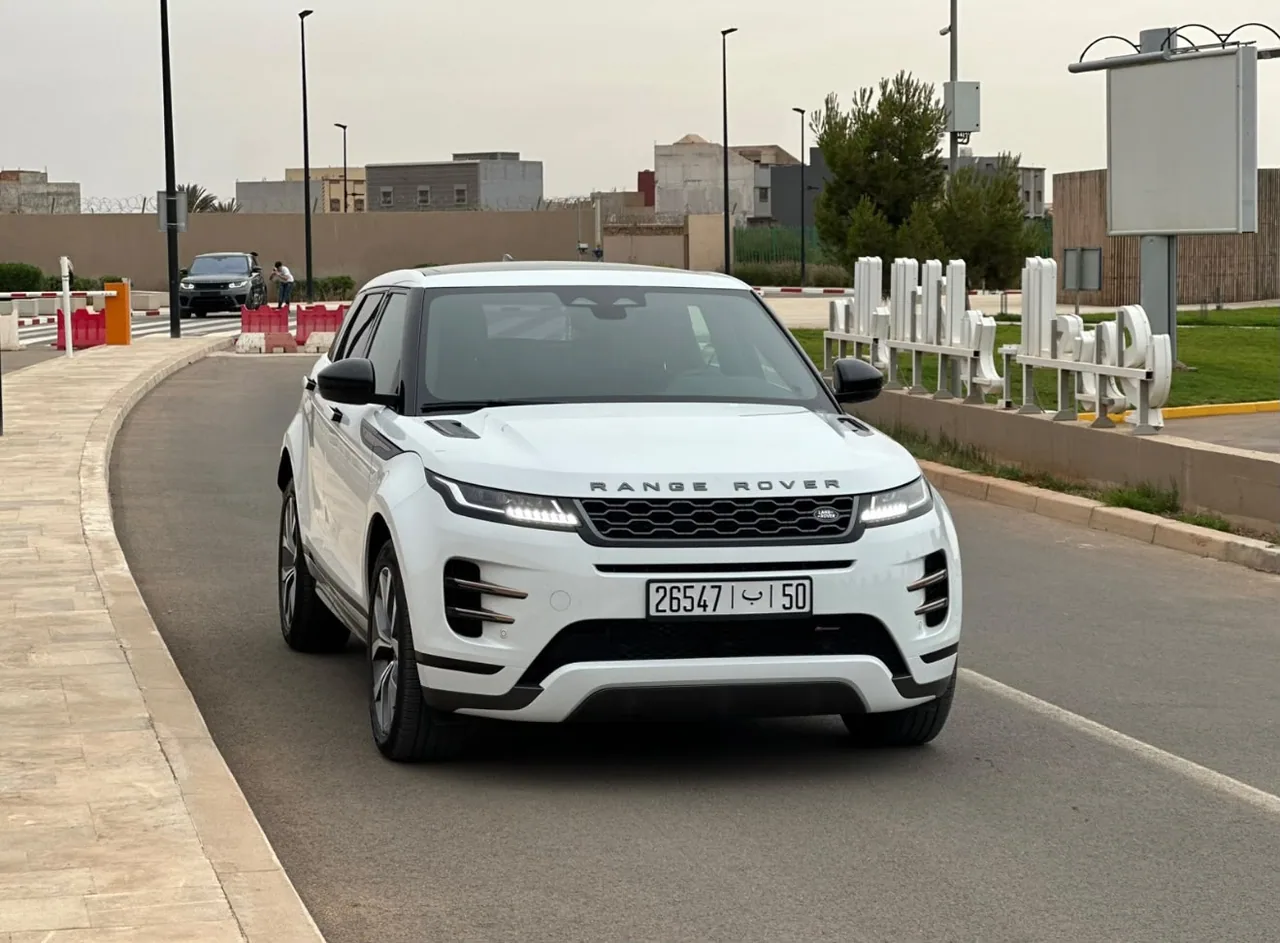 White Range Rover Evoque, front three-quarter view