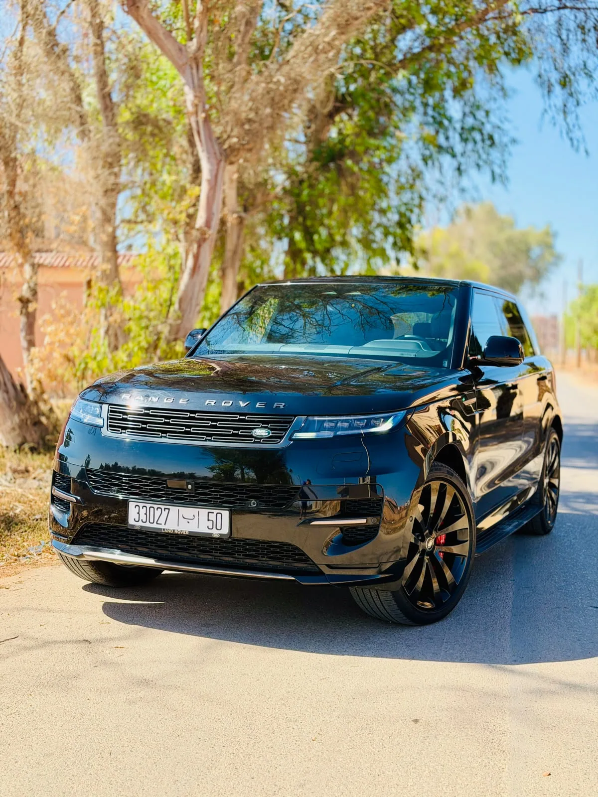 Black Range Rover Sport, front three-quarter view