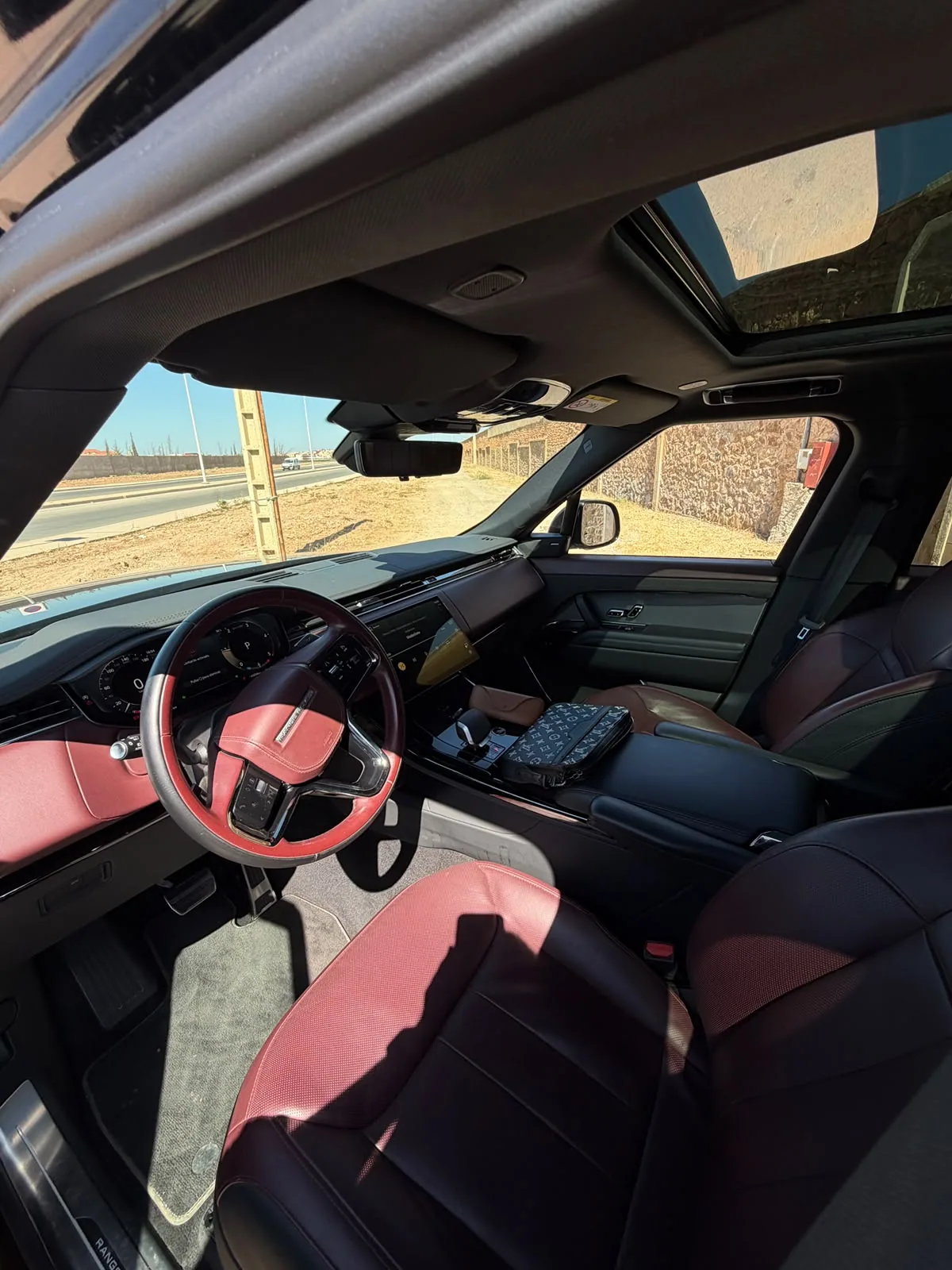 Range Rover Sport burgundy interior and glass roof