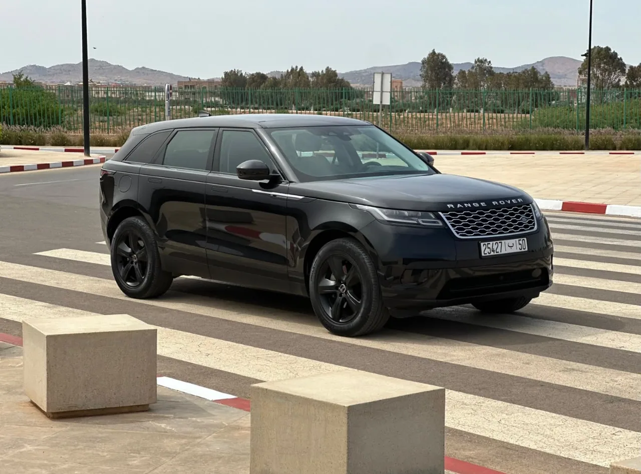 Black Range Rover Velar, front three-quarter view