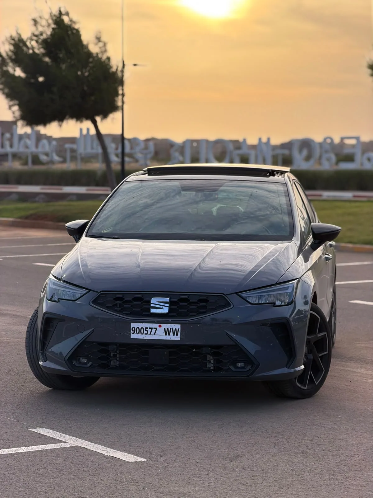 Black SEAT Ibiza with opening glass roof
