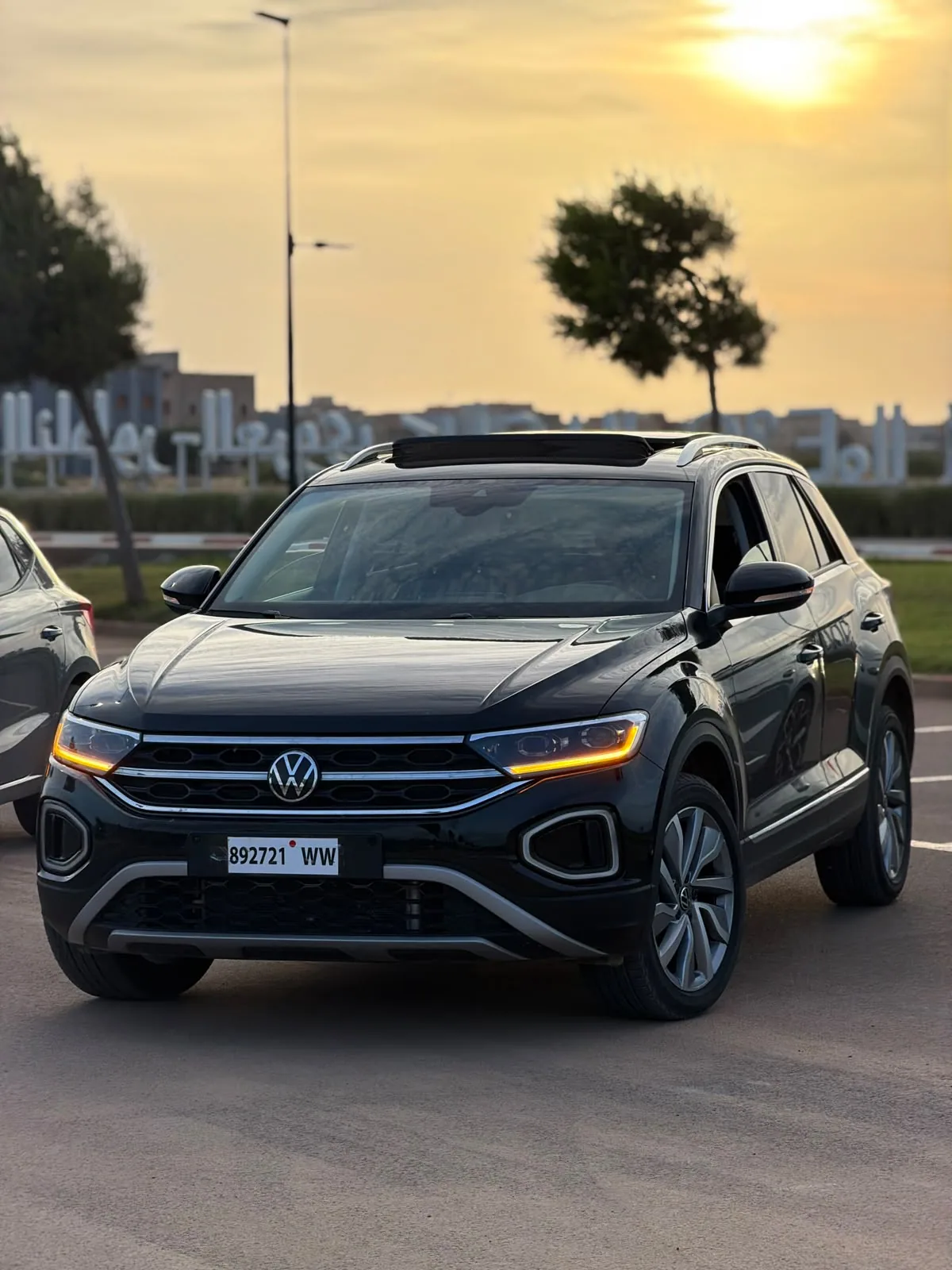 Black Volkswagen T-Roc with opening glass roof